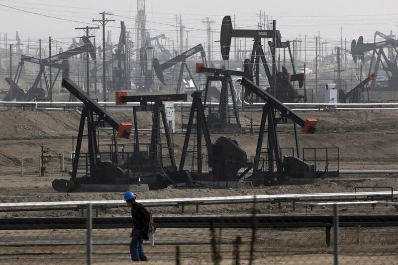 The US Energy Information Administration has increased its estimates of American oil output. Above, a thicket of pumpjacks at the Kern River Oil Field in Bakersfield, California. Jae C Hong / AP Photo