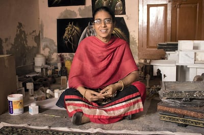 : Rajni, Vaishnavdas’ daughter, says, “My father painted the Bani Thani in 1979 which we’ve kept in the workshop even today. Now, the artists can’t give enough time to the fine art hand it shows in their work.” Courtesy: Sanket Jain