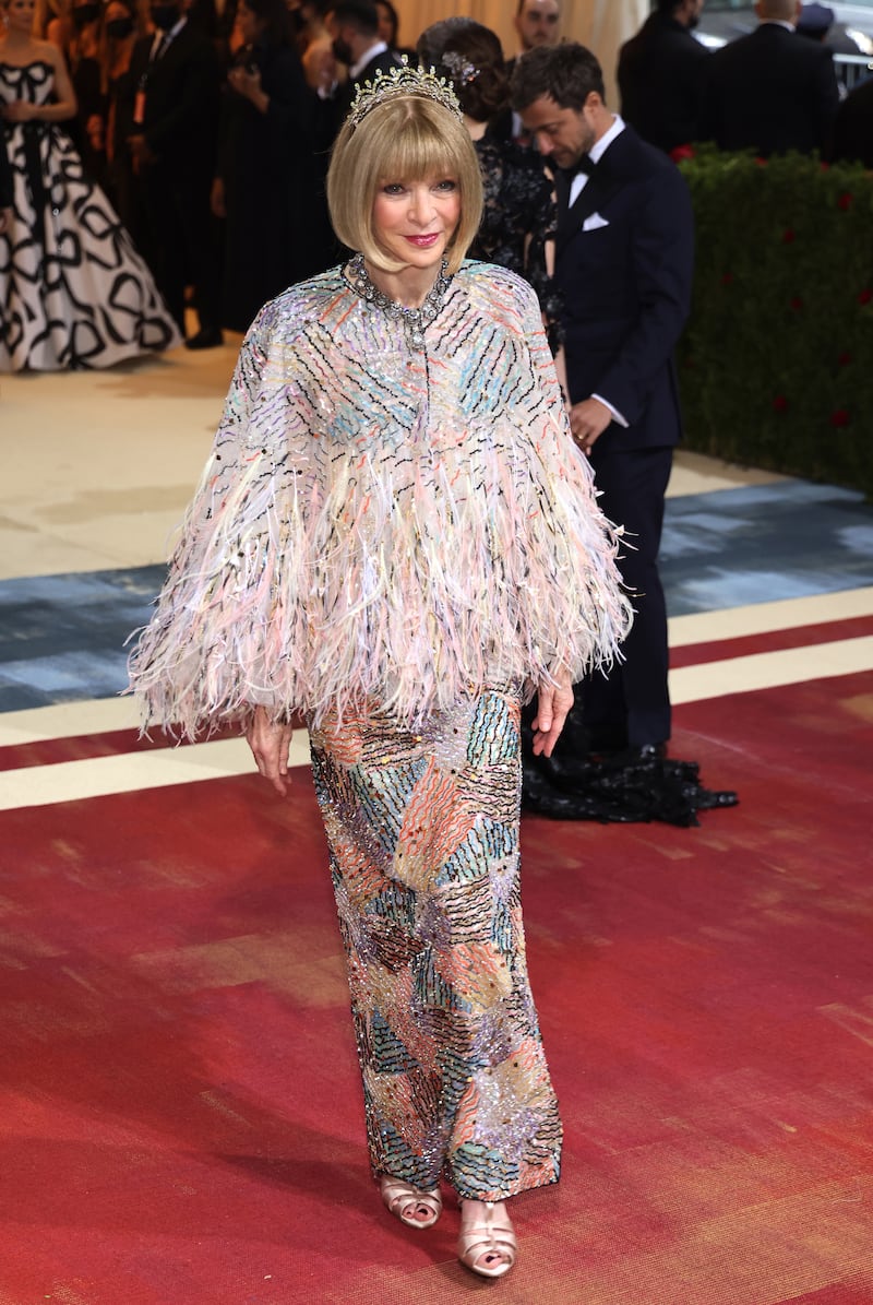Anna Wintour, wearing a multi-coloured sequin gown. EPA