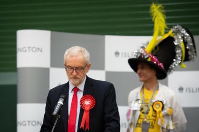 LONDON, ENGLAND - DECEMBER 13: Labour Party leader Jeremy Corbyn (L) speaks from the stage at Sobell leisure centre after retaining his parliamentary seat on December 13, 2019 in London, England. Labour leader Jeremy Corbyn has held the Islington North seat since 1983. The current Conservative Prime Minister Boris Johnson called the first UK winter election for nearly a century in an attempt to gain a working majority to break the parliamentary deadlock over Brexit. The election results from across the country are being counted overnight and an overall result is expected in the early hours of Friday morning. (Photo by Leon Neal/Getty Images)