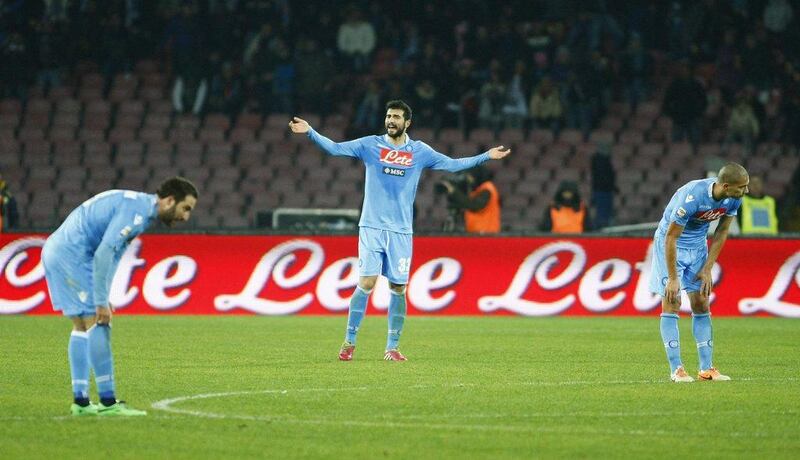 Raul Albiol, centre, scored Napoli's lone goal on Saturday. Carlo Hermann / AFP