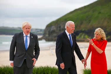 UK Prime Minister Boris Johnson with US President Joe Biden and his wife Jill at the G7 summit, in Cornwall, England. The leaders announced a tech partnership for Northern Ireland. EPA 