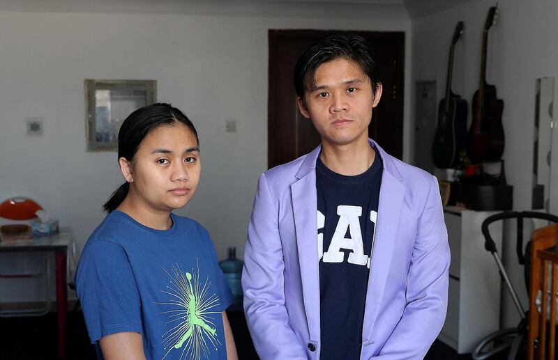 DUBAI , UNITED ARAB EMIRATES , JAN 27 – 2018 :- Sai Soe Naung Tun with his wife Naw Nona at their apartment in Al Nahda area in Dubai. They need donations to pay off their son’s medical bills in Dubai. (Pawan Singh / The National) For News. Story by Shareena Al Nuwais. 