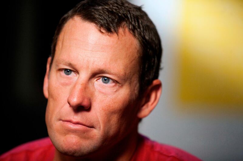 FILE - In this Feb. 15, 2011 file photo, Lance Armstrong pauses during an interview in Austin, Texas.Armstrong, on Thursday, April 19, 2018, has reached a $5 million settlement with the federal government in a whistleblower lawsuit that could have sought $100 million in damages from the cyclist who was stripped of his record seven Tour de France victories after admitting he used performance-enhancing drugs throughout much of his career.  (AP Photo/Thao Nguyen, File)