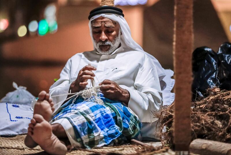 Abu Dhabi, United Arab Emirates, May 18, 2019. –  ‘Ramadan at Al Hosn’, which aims to revive the authentic traditions of Ramadan by recalling the memories rooted in our past, when the people of Abu Dhabi gathered at Qasr Al Hosn to celebrate the holy month. --  Emirati fisherman hut which demonstrates net making.
Victor Besa/The National
Section:  NA
Reporter: