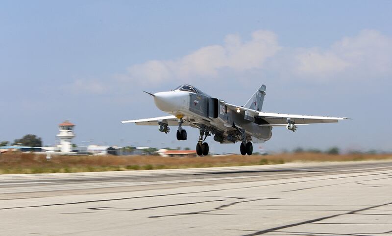 A Russian Sukhoi Su-24 bomber takes off from the Hmeimim airbase in the Syrian province of Latakia, October 3, 2015. AFP