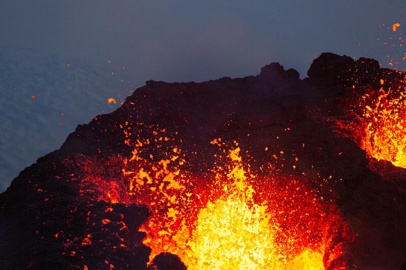 Lava erupts from the volcano's two craters on the Reykjanes Peninsula. Getty Images