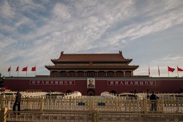 Security personnel stand guard in front of Tiananmen Gate, near the Great Hall of the People, the venue for the annual meeting of the National People's Congress in Beijing. The NPC, delayed from March by the coronavirus, opened on Friday May 22 for a week and announced the direction of policy for the year. AFP