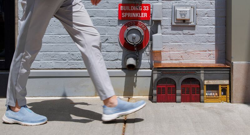 A 'mouse house' fire station and book store, designed by an anonymous group of Swedish artists known as 'AnonyMouse,' in Newton, Massachusetts, US. Known for mouse-themed miniatures in Sweden, France and the Isle of Man, the collective has started installing several of the miniatures in Boston and surrounding areas.  EPA 