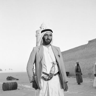 Sheikh Zayed Bin Sultan Al Nahyan standing in front of Qasr Al Hosn. November 1956. Source: National Archives