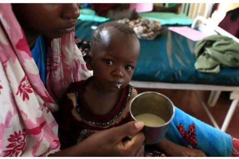 Siyad Ali, 2, a severely malnourished refugee from Somalia, is fed food supplements inside the stabilisation ward in the International Rescue Committee, (IRC) clinic at the Hagadera refugee camp in Dadaab, near the Kenya-Somalia border.