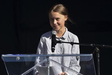 Environmental activist Greta Thunberg takes to the podium to address young campaigners and their supporters in Montreal on Friday. AFP