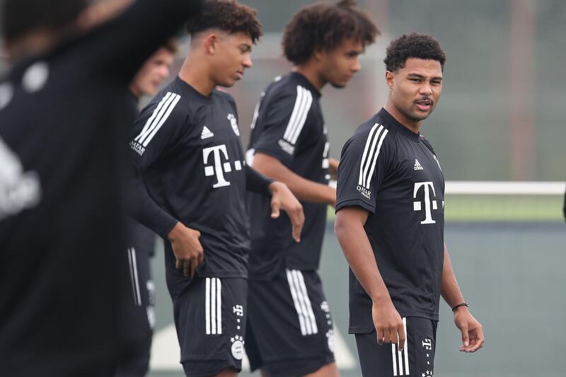 Serge Gnabry smiles during their first training session of the season. Getty Images