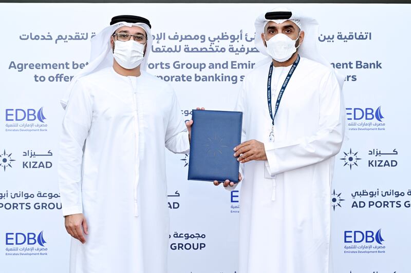 Ahmed Mohamed Al Naqbi, left, and Abdullah Al Hameli at the signing ceremony between Emirates Development Bank and AD Ports Group. Photo: EDB