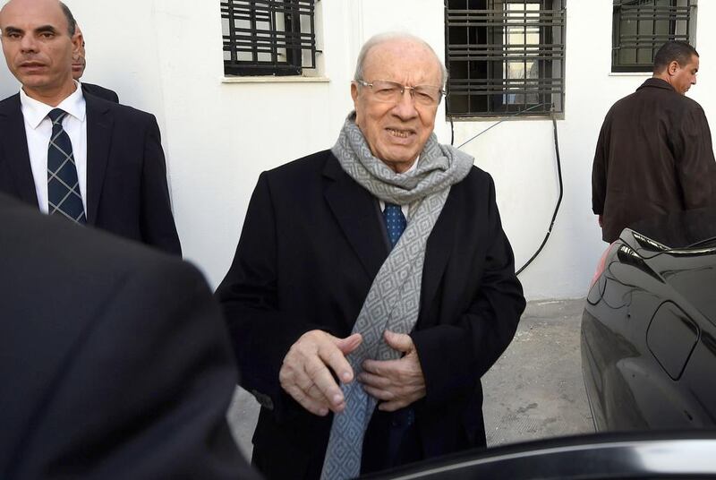 Beji Caid Sebsi, who claimed victory in Tunisia’s first free presidential election, arrives at his party’s headquarters in Tunis yesterday. The veteran politician won the country’s top job at the age of 88 for a five-year term.  Fethi Belaid / AFP



