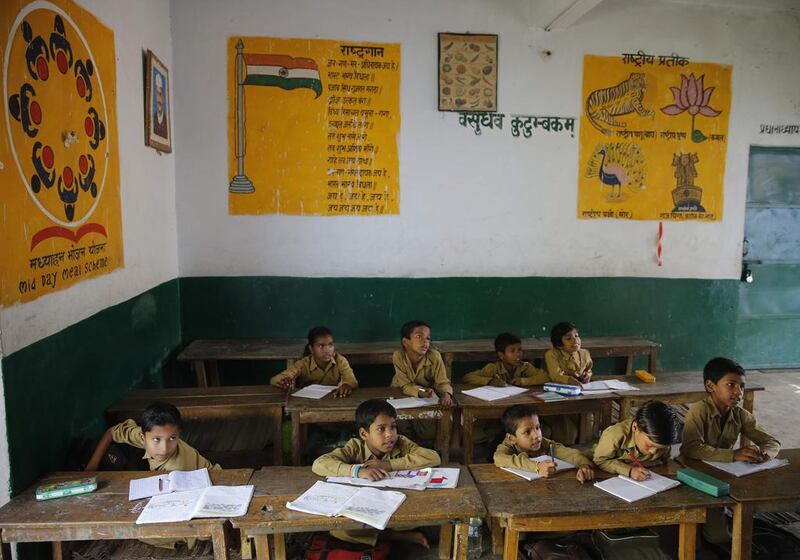 Above, children at a government-run school in Allahabad. Rajesh Kumar Singh / AP Photo