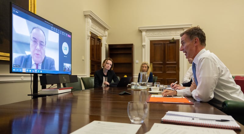 Mr Hunt holds a video conference call with Bank of England Governor Andrew Bailey from his offices in the Treasury. Photo: HM Treasury