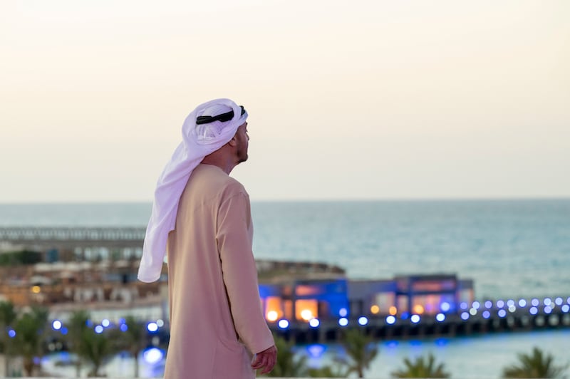 Sheikh Mohamed takes in the view from the Regal Heights hotel.