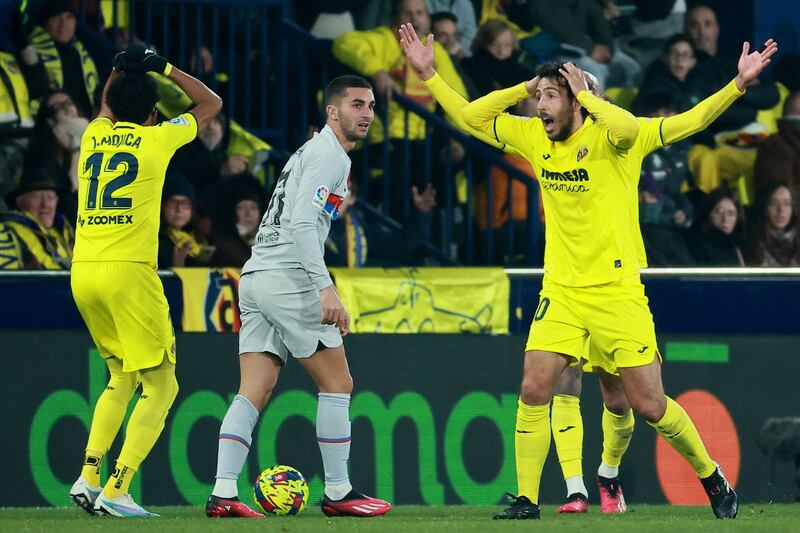 Villarreal defender Johan Mojica and midfielder Daniel Parejo react during the match against Barcelona. AFP