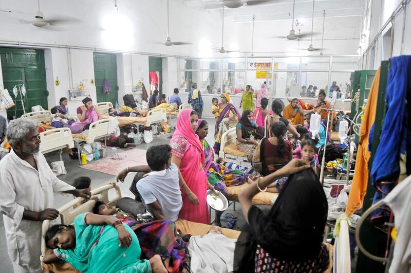 DEORIA, INDIA - AUGUST 14: Patients waiting at A.E.S (Acute Encephalitis) ward at Babu Mohan Singh district hospital on August 14, 2017 in Deoria, India. More than 60 children have reportedly died at the BRD Medical College Hospital over the last six days and at least 30 deaths in two days. (Photo by Deepak Gupta/Hindustan Times via Getty Images)