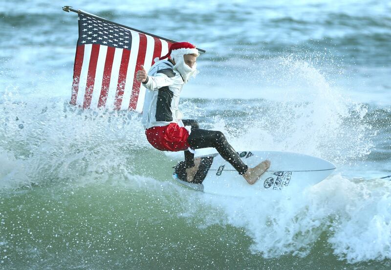 Thousands of surfers and spectators crowded the beach for the annual gathering, which started as a lark by George Trosset 13 years ago. Orlando Sentinel / AP