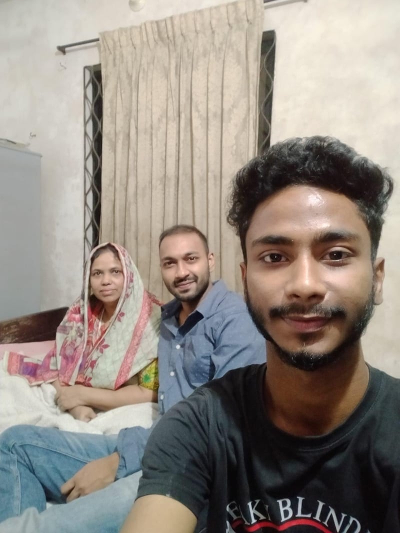 Ainul Hoque (centre), from Chittagong, is among 22 Bangladeshi sailors who were taken hostage by Somali pirates for over a month. His younger brother Mainul Hoque and his mother Lutfi Ara (pictured) are relieved the crew has been released. Photo: The Hoque family