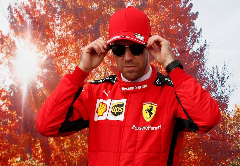 Ferrari driver Sebastian Vettel arrives for the media day.