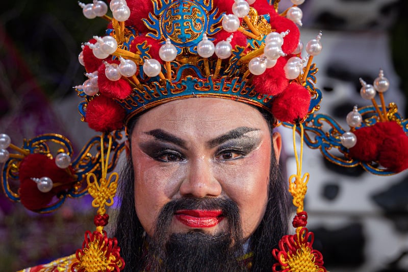 The God of Wealth arrives at the Lunar New Year celebration at Thean Hou Temple in Kuala Lumpur, Malaysia, on February 10, when the Year of the Dragon begins. Getty Images