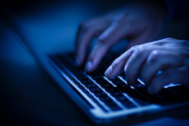 BERLIN, GERMANY - JUNE 22: In this photo Illustration hands typing on a computer keyboard on June 22, 2016 in Berlin, Germany. (Photo Illustration by Thomas Trutschel/Photothek via Getty Images) *** Local Caption ***  op27se-online-troll.jpg