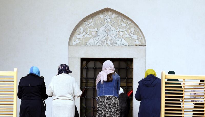Bosnian Muslim women pray in front of the main mosque in Sarajevo, Bosnia and Herzegovina.  EPA