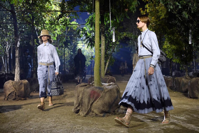 Models walk in a set filled with trees at Christian Dior, for&nbsp; Women&#39;s Spring-Summer 2020.AFP
