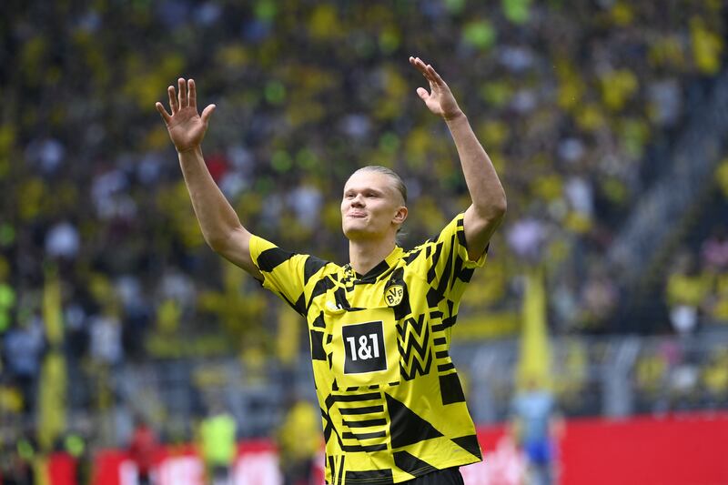 Haaland waves farewell to the fans before his final home and departure for Manchester City game against Hertha Berlin on May 14, 2022.  AFP