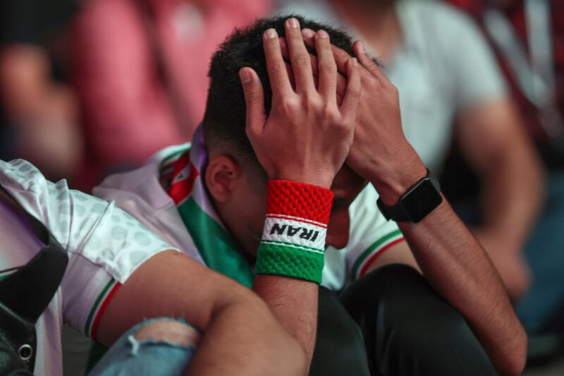 This Iranian fan can't watch as England hammered his country's team 6-2. Bloomberg