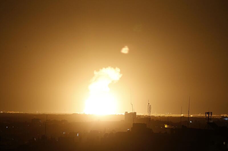 Flames are seen following an Israeli airstrike in the town of Khan Yunis, in the southern Gaza Strip. AFP