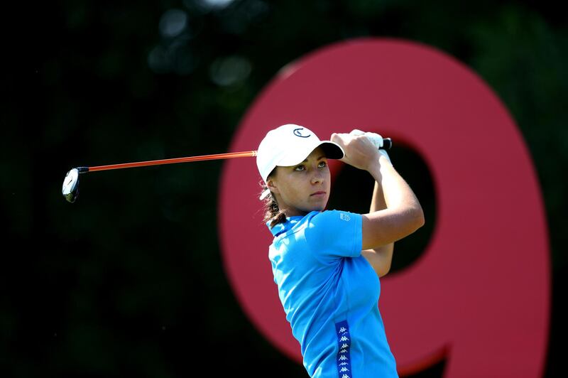 Emilie Paltrinieri of Italy plays her tee shot on the 9th hole. Getty