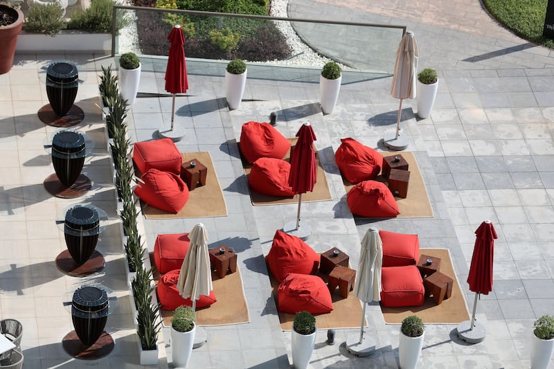 Guest can unwind on beanbags al fresco at Th8 Palm.