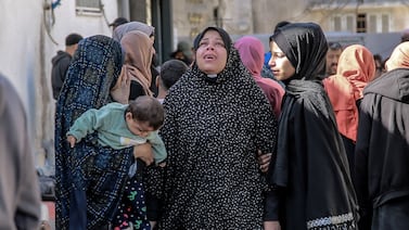 Palestinian women mourn their relatives killed in Israeli bombardment in front of the morgue at Al Shifa Hospital in Gaza city. AFP