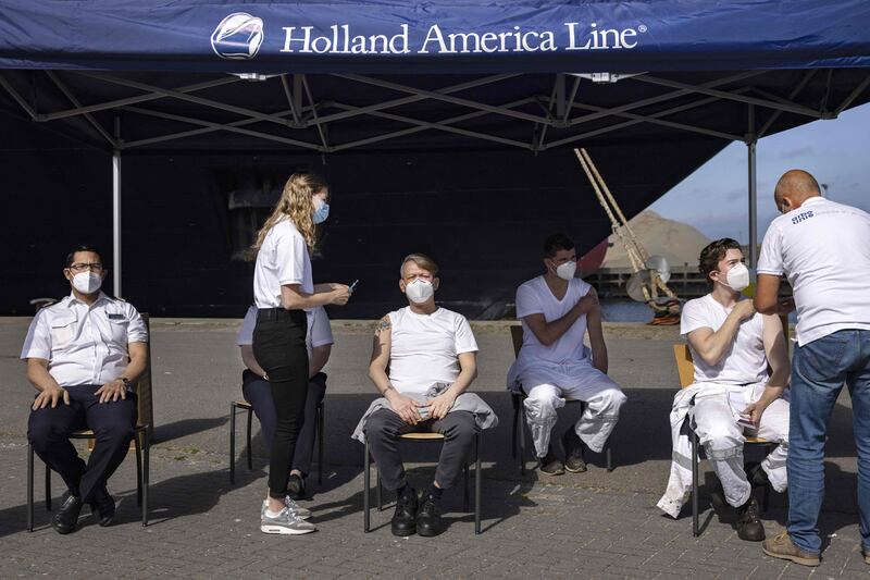 Cruise ship Oosterdam crew members receive Janssen Covid-19 vaccine in IJmuiden in July on the first day of coronavirus vaccination of cruise ships that sail under the Dutch flag.