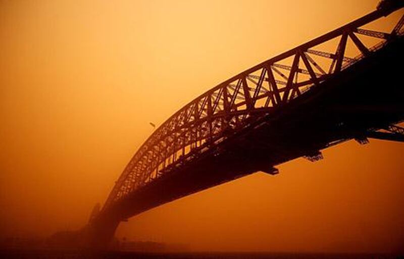 SYDNEY, AUSTRALIA - SEPTEMBER 23:  The Sydney Harbour Bridge is seen on September 23, 2009 in Sydney, Australia. Severe wind storms in the west of New South Wales have blown a dust cloud that has engulfed Sydney and surrounding areas.  (Photo by Matt Blyth/Getty Images) *** Local Caption ***  GYI0058450680.jpg