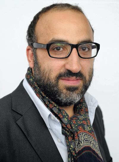 DOHA, QATAR - OCTOBER 29:  Filmmaker Ahmad Ghossein poses for a portrait in the portrait studio at Katara Cultural Village during the 2011 Doha Tribeca Film Festival on October 29, 2011 in Doha, Qatar.  (Photo by Andrew H. Walker/Getty Images for Doha Film Institute)