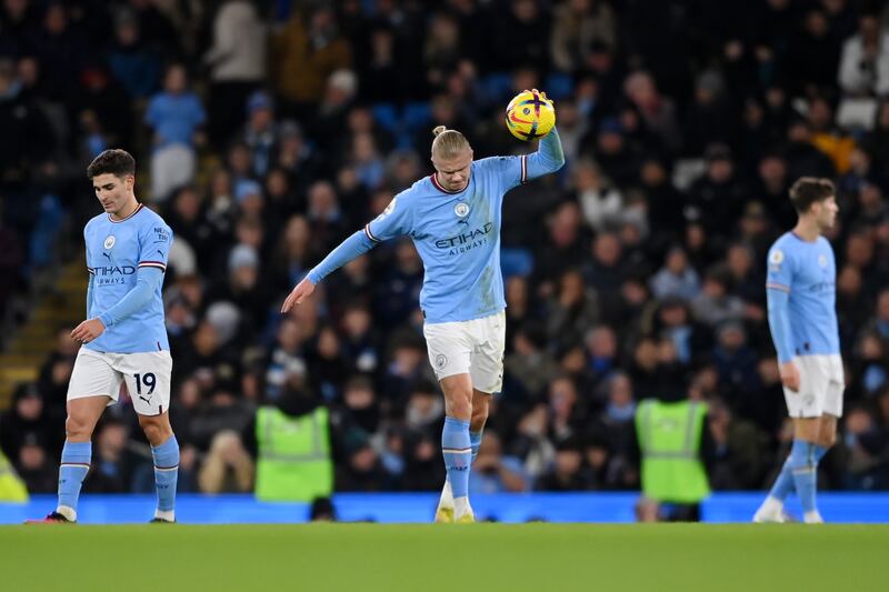 City's Erling Haaland reacts after Emerson scores Tottenham's second goal. Getty