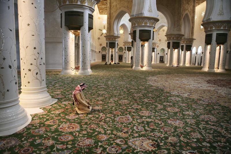 United Arab Emirates - Abu Dhabi - September 2 - 2008:  Mohammed Al Harmoudi prays at Sheikh Zayed Grand Mosque Tuesday afternoon (Galen Clarke/The National) *** Local Caption ***  GC-Ramadan-05.jpgGC-Ramadan-05.jpg