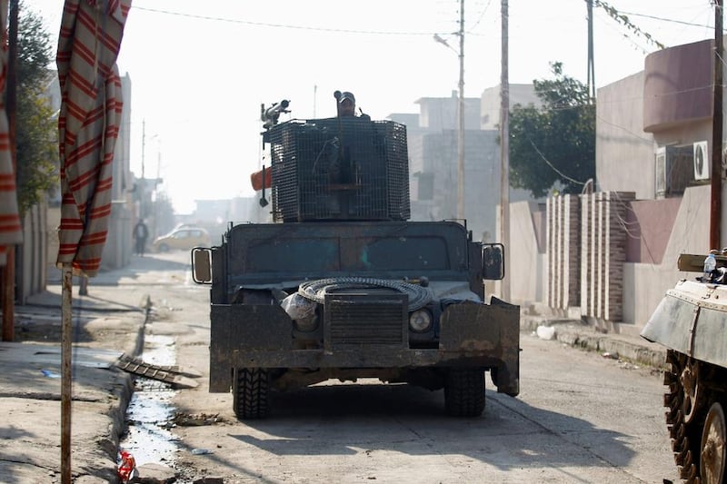 A military vehicle of the Iraqi rapid response forces in the Mithaq district of eastern Mosul on January 5, 2017, two days after it was recaptured from ISIL. Khalid al Mousily / Reuters