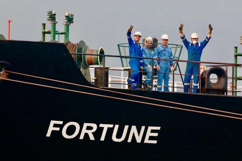 Workers on the 'Fortune' the Iranian ship with gasoline in Puerto Cabello, Venezuela.  EPA