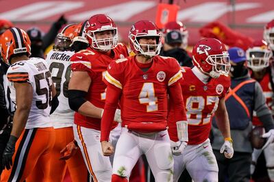 Kansas City Chiefs quarterback Chad Henne celebrates after a run during the second half of an NFL divisional round football game against the Cleveland Browns, Sunday, Jan. 17, 2021, in Kansas City. (AP Photo/Charlie Riedel)