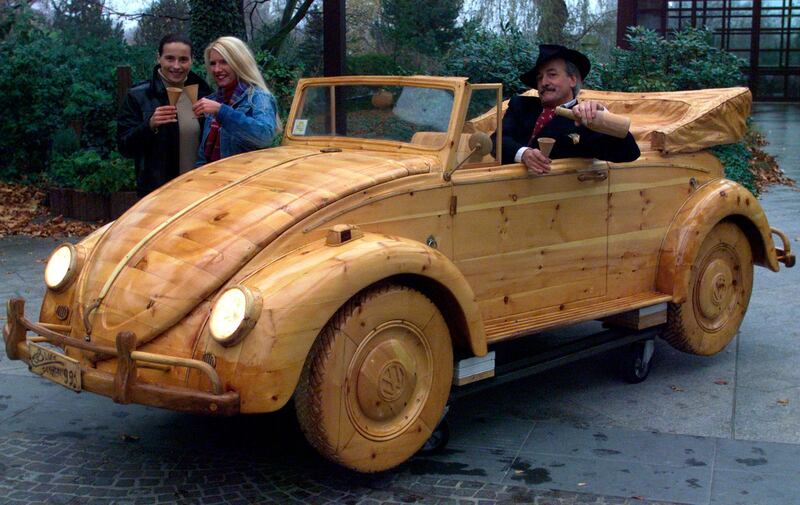 A Maggiolino Cabriolet, the famous Beetle completely made of wood, is shown by Italian artist Livio De Marchi in Essen, Germany. AP Photo