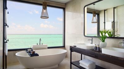 Views over the Indian Ocean from the standalone bathtub are second to none. Photo: Anantara 