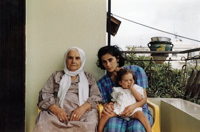 Great-grandmother Umm Ali, Hiam and a young Lina on a balcony in the 1990s. Photo: Lina Soualem