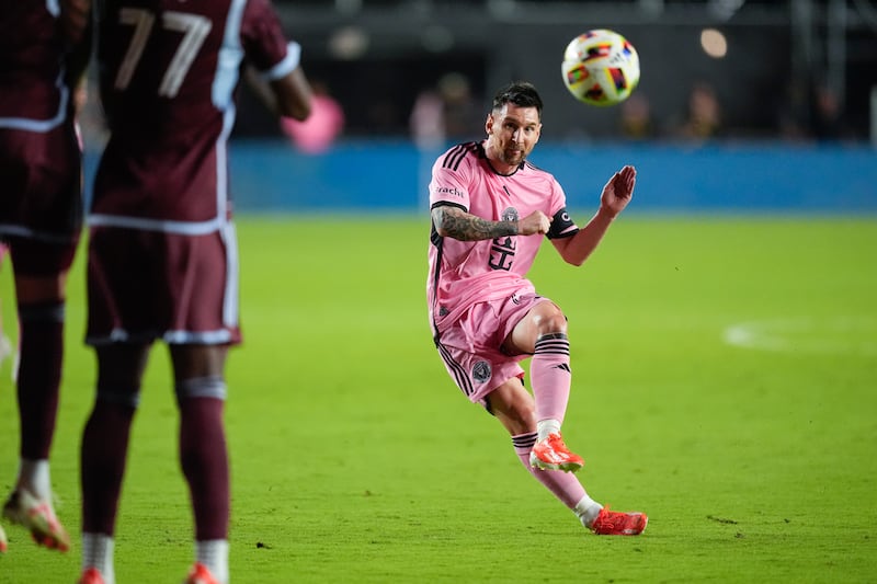 Inter Miami forward Lionel Messi, right, takes an unsuccessful free-kick against the Colorado Rapids. AP
