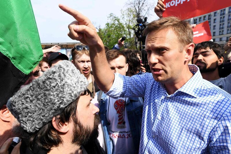 (FILES) In this file photo opposition leader Alexei Navalny speaks to pro-Kremlin activists during an unauthorized anti-Putin rally on May 5, 2018 in Moscow, two days ahead of Vladimir Putin's inauguration for a fourth Kremlin term.
 The United States on March 2, 2021 imposed sanctions on seven senior Russians as it said its intelligence concluded that Moscow was behind the poisoning of jailed Kremlin critic Alexei Navalny. In action coordinated with the EU, the United States renewed demands that Russia free Navalny, who was arrested in January upon his return to Moscow as he spurred massive rallies through his allegations of corruption by President Vladimir Putin.
 / AFP / Kirill KUDRYAVTSEV
